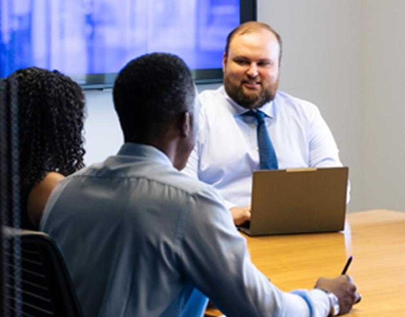 Walkers colleagues at a meeting